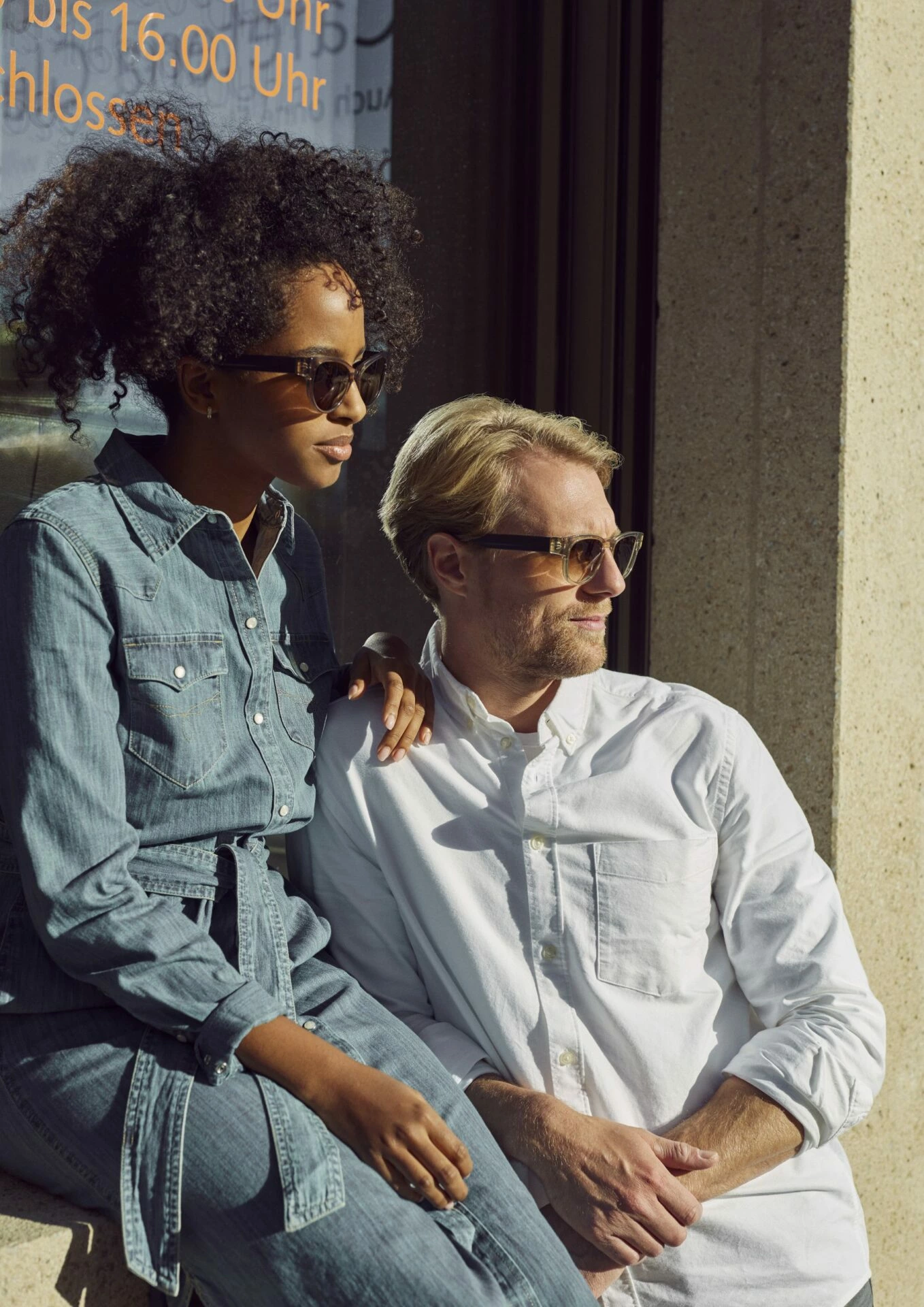 Couple wearing FAUNA sunglasses on a sunny day